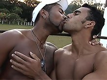 Muscular ethnic dudes pose and fuck outdoors